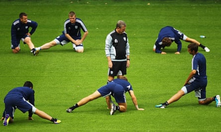 Roy Hodgson looks relaxed with West Brom players in 2011 but can be passionate and forceful when required.