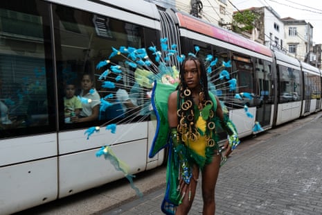 Madah Sodré, a member of the House of La Bella Mafia, wears an outfit made from materials discarded after carnival.