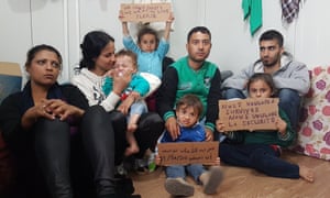 Lawand Haji Mohamad, centre, surrounded by his family
