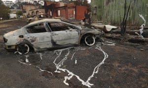 The melted alloy wheels of a car destroyed by fire on the New South Wales south coast
