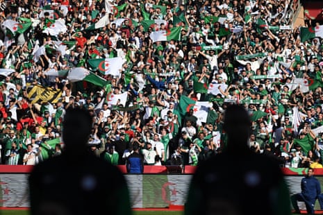 Algeria's supporters cheer before the Africa Cup of Nations quarter-final against Nigeria.