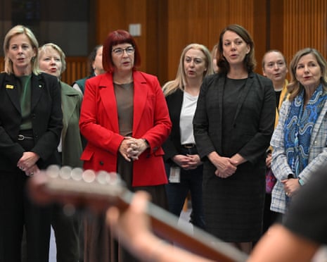 Shadow Minister for the Arts Angie Bell, Liberal member for Durack Melissa Price and Independent member for Mackellar Sophie Scamps sing at the Parliamentary Pub Choir experience.