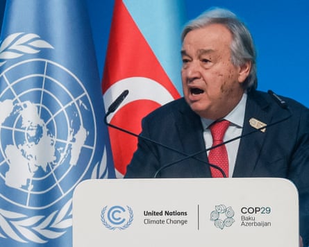 António Guterres speaking at a Cop29 podium