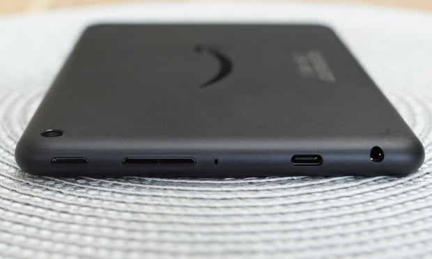 The buttons and charging port on the side of the Amazon Fire 7 tablet.
