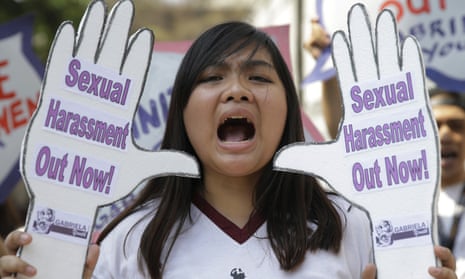 A Filipino student protests against sexual harassment during a rally in Manila
