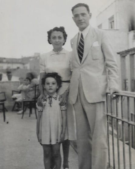 Black and white image of a young Lola and her parents