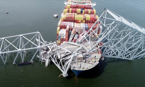 Cargo ship Dali is stuck under part of the structure of the Francis Scott Key Bridge in Baltimore.