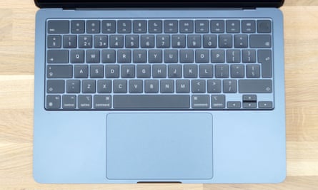 A photo showing the deck of the MacBook Air including trackpad and keyboard.
