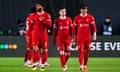 Liverpool players walk off after their 3-1 aggregate defeat against Atalanta