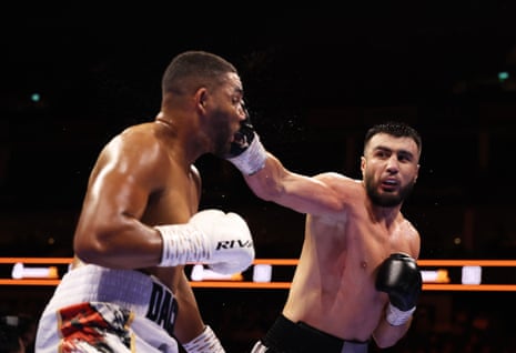 Bakhodir Jalolov lands on Solomon Dacres.
