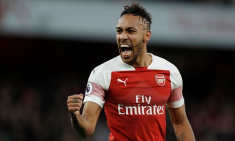 Arsenal’s Pierre-Emerick Aubameyang celebrates after scoring his side’s opening goal from the penalty spot at the Emirates Stadium in London.