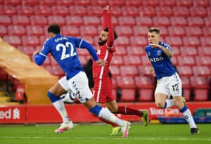 Muhammad Salah throws his arms in the air.
