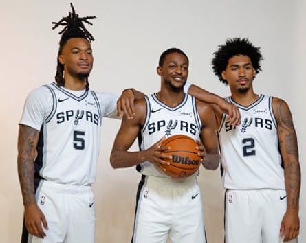 Stephon Castle, De’Aaron Fox and Dylan Harper of the San Antonio Spurs
