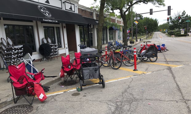 strollers and bikes abandoned on street