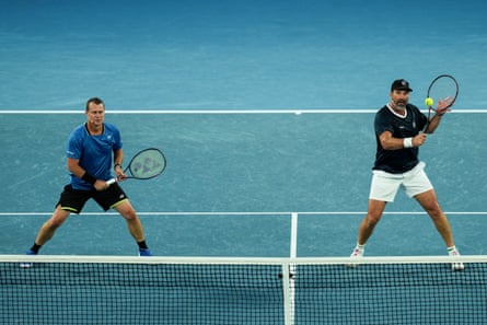Lleyton Hewitt and Pat Rafter at the net during a tennis exhibition match before the 2026 Australian Open at Melbourne Park