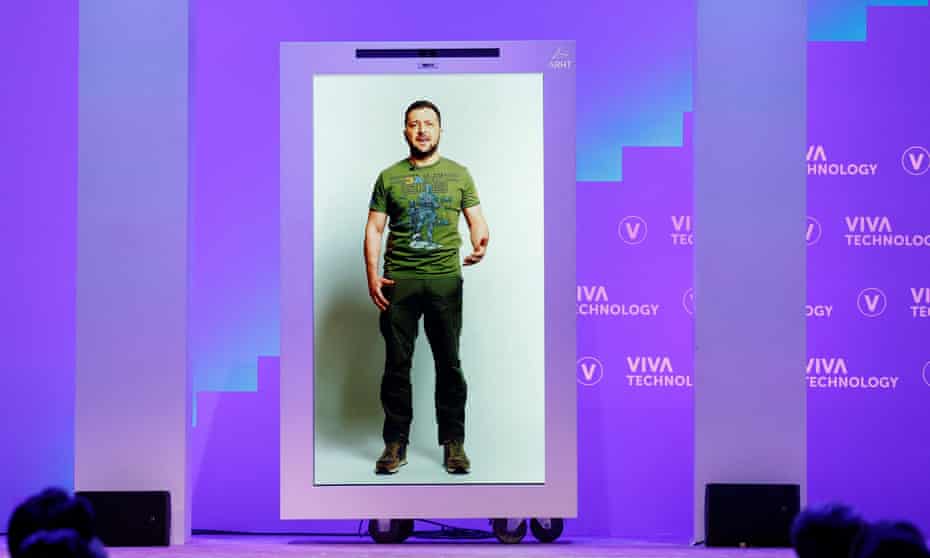 Volodymyr Zelensky delivers a speech in a 3D hologram projection at the Viva Technology conference in Paris.