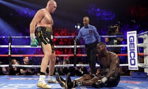 Tyson Fury knocks down Deontay Wilder in the fifth