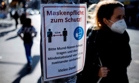 ‘Masks required for protection’: a sign requesting the wearing of face masks and pointing out social distancing rules in Berlin’s Kreuzberg district earlier this month.