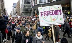 Crowds march through Brussels on Sunday as part of a demonstration organised by Europeans United.