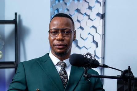 Shadaya Knight sits at a microphone.