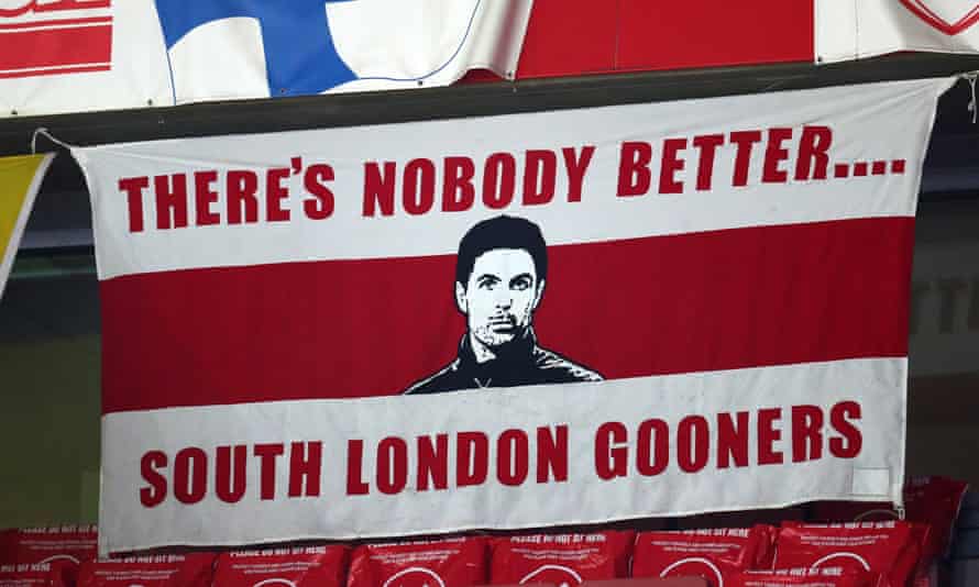 A banner supporting Mikel Arteta hangs at the Emirates during the Carabao Cup quarter-final capitulation to Manchester City.