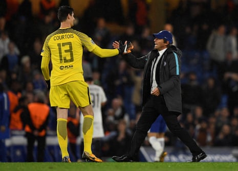 Conte celebrates with Courtois after the final whistle.