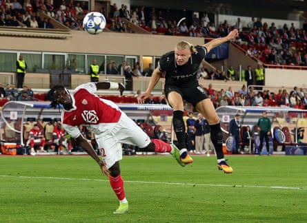 Erling Haaland heads in Manchester City’s second goal.