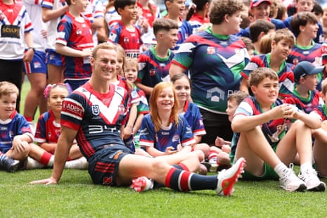 Daly Cherry-Evans of the Roosters looks on as the Rooster team pose with local team players during a Sydney Roosters NRL media opportunity ahead of the NRL Grand Final.