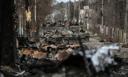 Destroyed Russian armoured vehicles line the street of Bucha, west of Kyiv, on 4 March 2022.