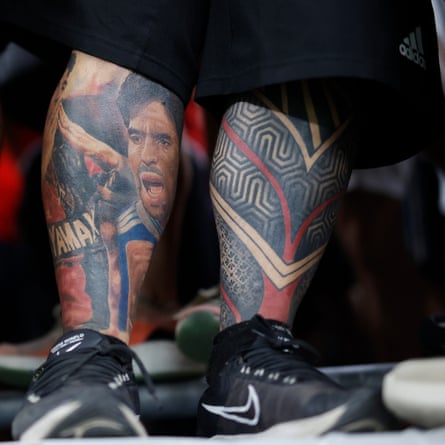A tattoo of Diego Maradona seen on the leg of an Argentina fan.