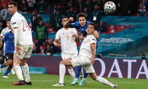 Italy's Federico Chiesa scores the first goal.