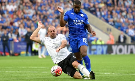 Jeff Schlupp of Leicester City is challenged by Darron Gibson of Everton resulting in a penalty kick.