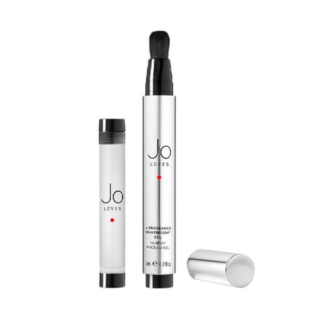 Jo Loves Black Cashmeran and Tonka Paintbrush and lid. The packaging is silver and black.