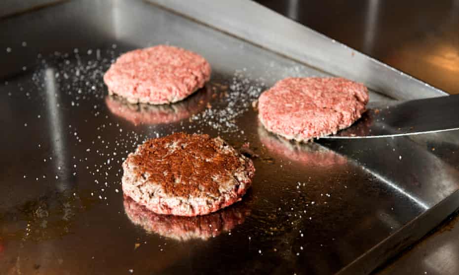 Vegan or not? Impossible burgers cooking. 