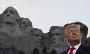 President Donald Trump smiles at Mount Rushmore National Memorial, in July
