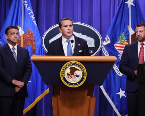 People stand at lectern