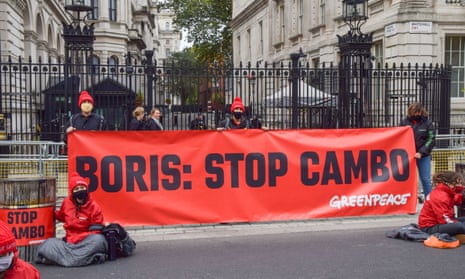 Activists at a Stop Cambo protest outside Downing Street in London. 