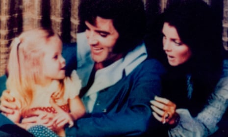 A family photo shows Lisa Marie Presley with Elvis  and Priscilla Presley in 1970.
