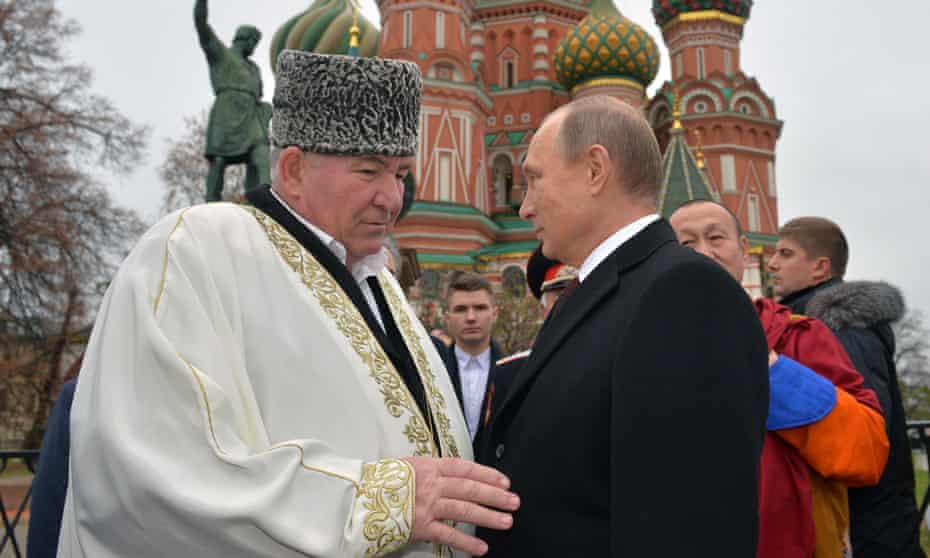 Mufti Ismail Berdiyev pictured with Vladimir Putin in 2015.