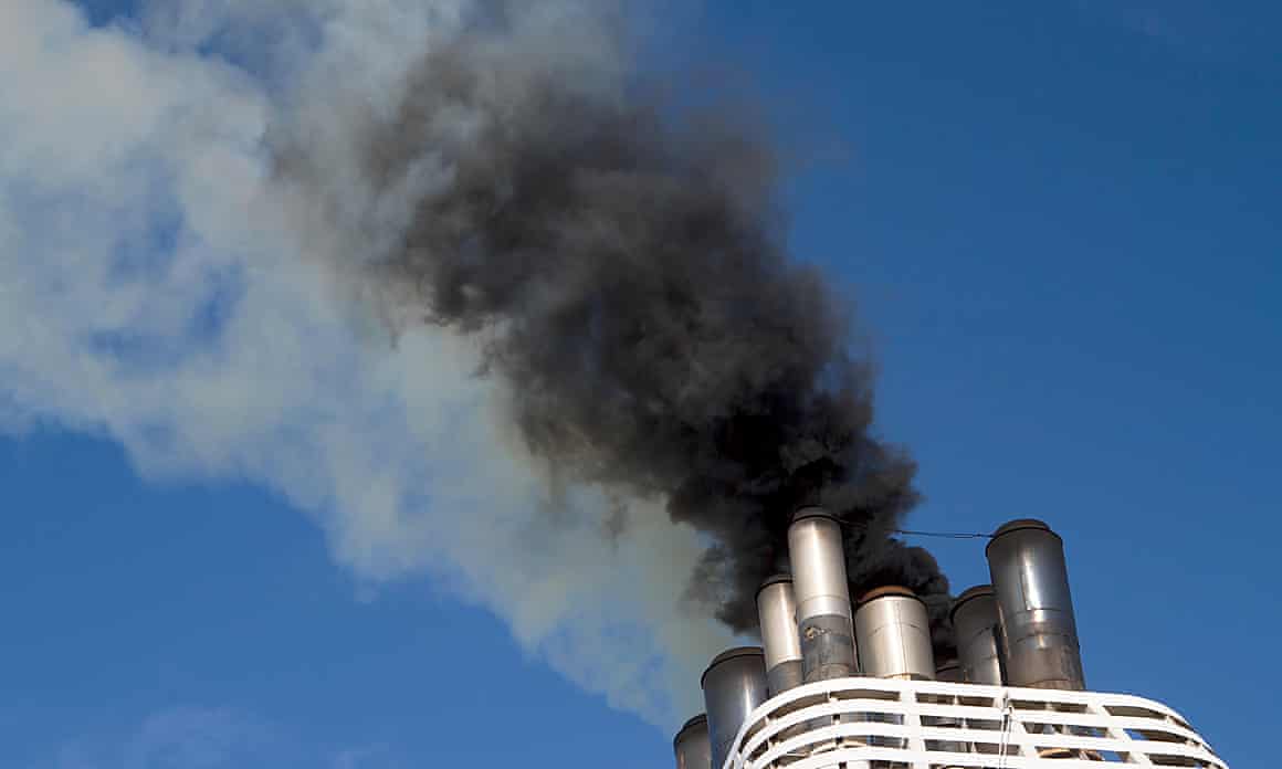 Smoke billowing from ship’s funnel