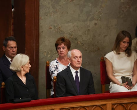 Hungary's ruling Tisza party nominee Andras Baka sits beside family members as the parliament votes to elect a new president in Budapest, Hungary.