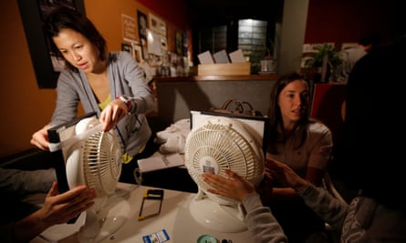 People assemble homemade air purifiers during a workshop organised by Smart Air China in Shanghai, 2014.