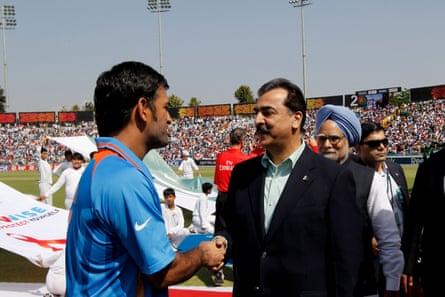 India’s cricket captain Mahendra Singh Dhoni shakes hands with Pakistan’s prime minister, Yousaf Raza Gillani, as India’s prime minister Manmohan Singh looks on before the start of the 2011 World Cup semi-final match between India and Pakistan.