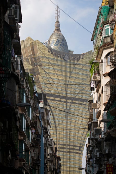 Grand Lisboa and contrasting local residential buildings,Macau