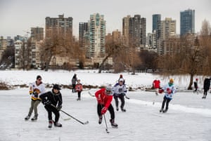 Vancouver Cold Weather, Vancouver, Canada - 29 Dec 2021Mandatory Credit: Photo by Canadian Press/REX/Shutterstock (12665081e) People play pond hockey at Vanier Park after the pond froze over after numerous days unseasonably cold temperatures in Vancouver, on Wednesday, December 29, 2021. Weather warnings covered most of British Columbia on Wednesday as bitter arctic winds sent temperatures plunging, and another round of snow could add new challenges to the bone-chilling conditions. Vancouver Cold Weather, Vancouver, Canada - 29 Dec 2021