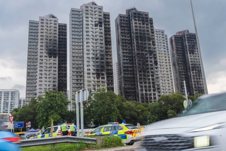 The estate’s exterior walls are heavily charred and damaged, with most units reduced to empty window frames.