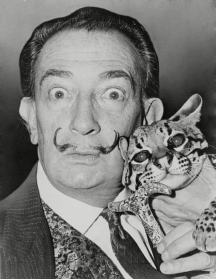 Salvador Dalí with his pet ocelot, in 1965.