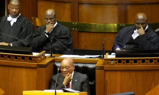Jacob Zuma, centre, was trying to give his state of the nation address in parliament when the EFF walked out.