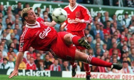 Robbie Fowler in flying action for Liverpool against Bolton.