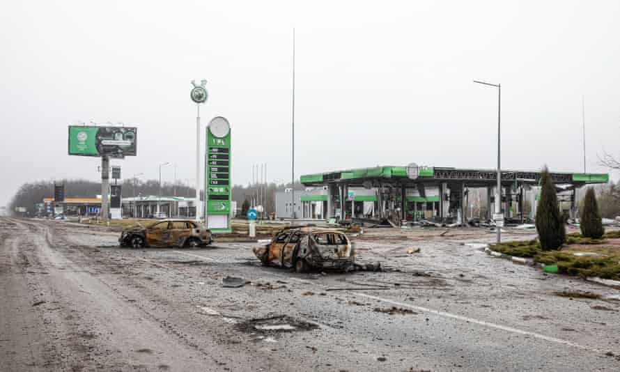 A destroyed car seen on a highway 20km from Kyiv. Almost 300 civilians have been killed along the road in between Zhytomyr and Kyiv near Bucha as most victims tried to cross the Buchanka river to reach the Ukrainian controlled territory and had been killed.
